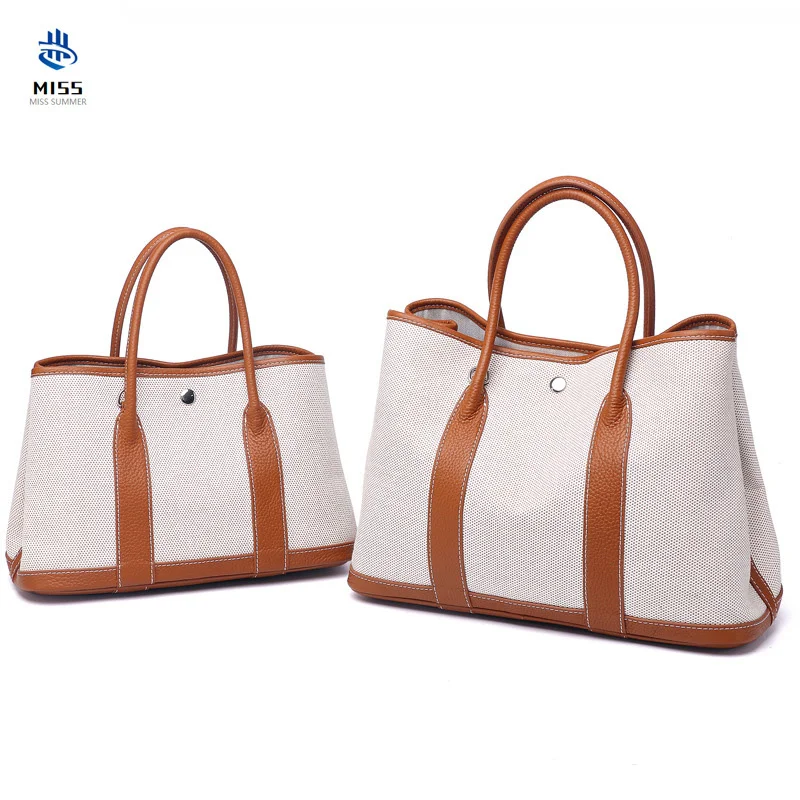 

The new luxury first layer cowhide with canvas one-shoulder ladies messenger bag leather handbags handbag garden bag