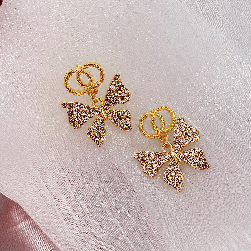 

Cute Female Crystal Butterfly Small Earrings Trendy Gold Color Stud Earrings For Women Charm White Zircon Wedding Earrings