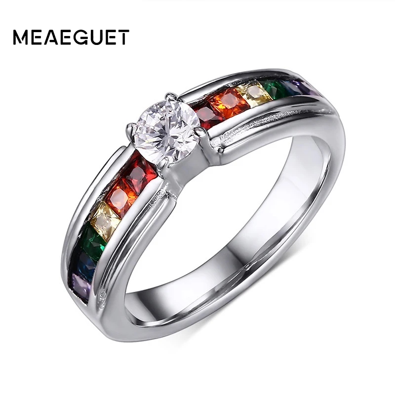 

Женские обручальные кольца с радужными кристаллами