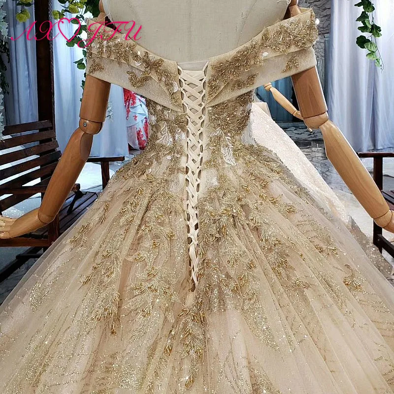 AXJFU Luxury princess golden flower lace boat neck beading crystal sparkly star bride tail wedding dress real photo 11669