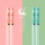 Милые палочки для еды, 1 пара, красивые Нескользящие палочки для суши с рисунком лепестков цветущего вишни, палочки для еды, экологически чистые палочки для еды - изображение