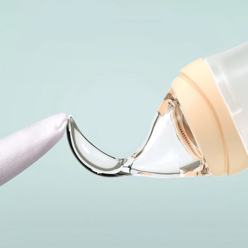 

Baby Feeding Bottle Silicone Squeeze Tableware Spoon Milk Cereal Training Feeder