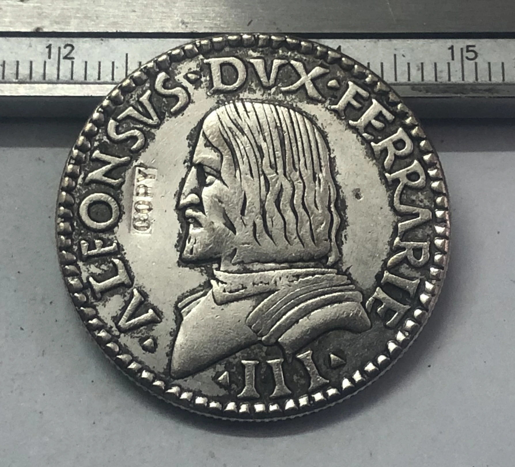 

Металлическая монета 1509-1522 Италия 1 Testone - Alfonso I