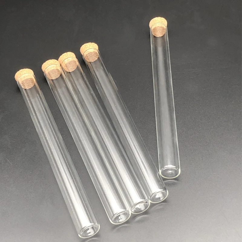 Пробирки стеклянные прозрачные с плоским дном и деревянными заглушками для