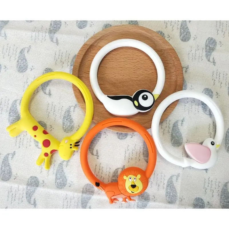 

Baby Round Teether Molar Bar Bracelet Silicone Cartoon Animal Chewing Soother Dropship