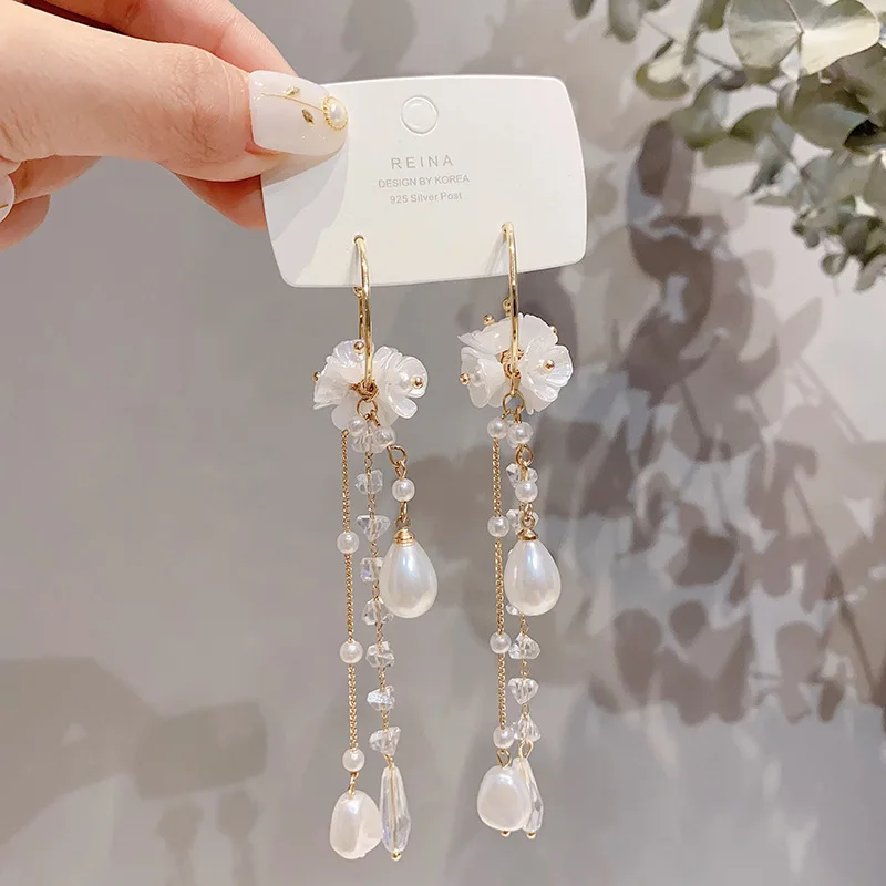 

Korean version of the new Baroque Flower Pearl Long tassel S925 Silver Needle Earrings Fashion versatile pendant
