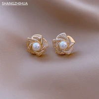2021 south koreas new luxury imitation pearl zircon flower earrings are unusual jewelry gift accessories for womens fashion