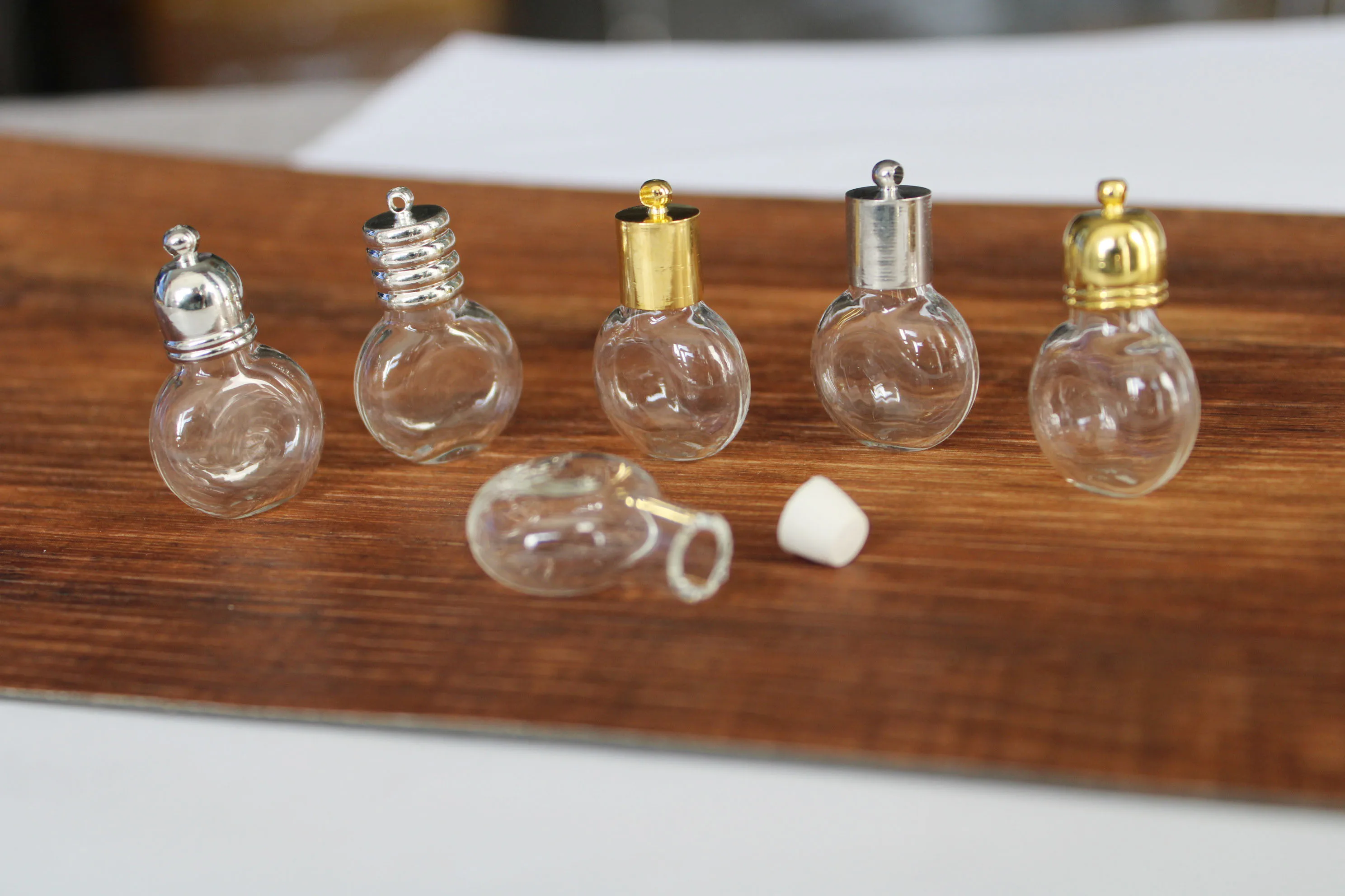 духи флакон. колпачки для парфюма. крышка для духов. крышка парфюм. крышка для духов.