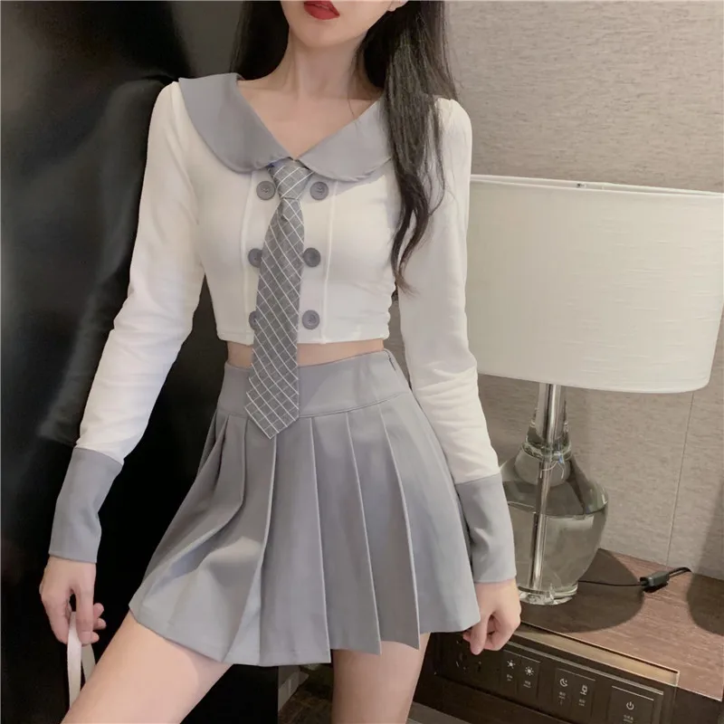 

Демисезонный укороченный топ с длинным рукавом и плиссированная мини-юбка