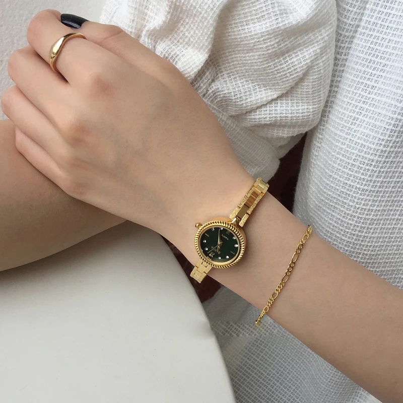 Women's gold retro round dial small gold watch fashion art quartz watch
