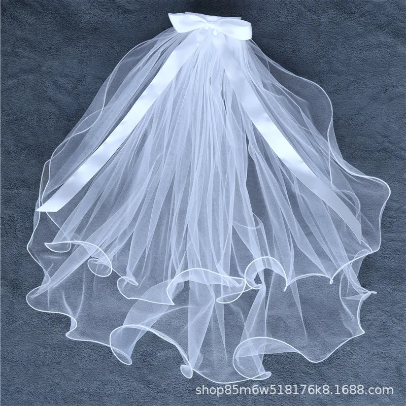 Белый бант двухслойная маленькая вуаль с боковым гребнем для волос фото тиара