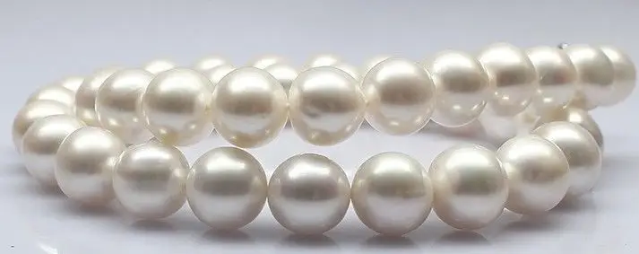 

Wholesale HUGE PERFECT ROUND 18"12-13MM SOUTH SEA GENUINE WHITE PEARL NECKLACE 14KGP