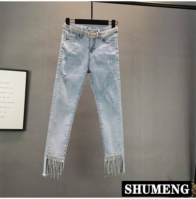 Джинсы женские облегающие синие тонкие эластичные с кисточками обтягивающие