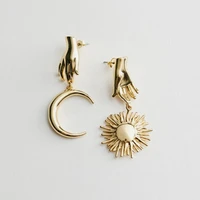 european and american creative fun metal palm sun moon earrings personality asymmetry exaggerated fashion earrings for women