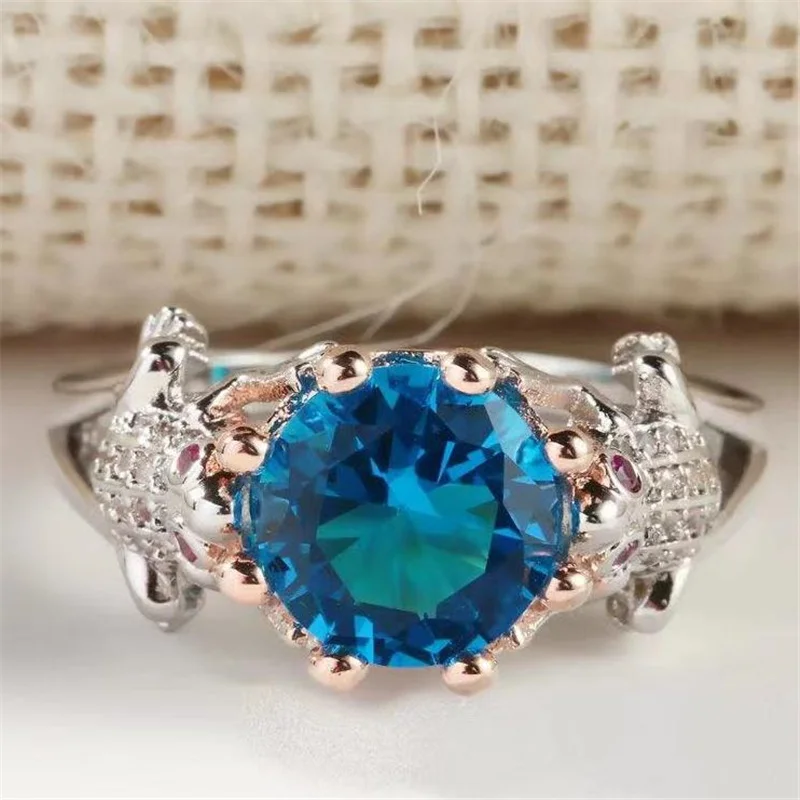 

BAOSHINA Creative Two-color Frog Blue Zircon Ring For Women Party Engagement Weddiing Jewelry Female Hand Accessories