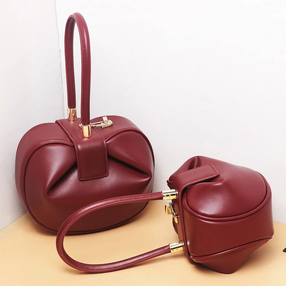 

genuine leather women's bag 2021 new portable dumpling bag, minority design, single shoulder diagonal span wonton bun