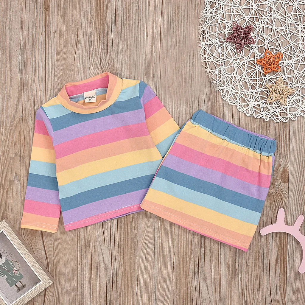 

2021 New baby girl and girl clothing summer fashion cute long-sleeved rainbow striped top short skirt set