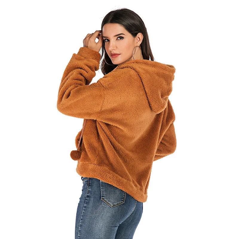 

2020 autumn and winter women's European and American casual fashion fluffy coat women's solid color loose warm hooded coat
