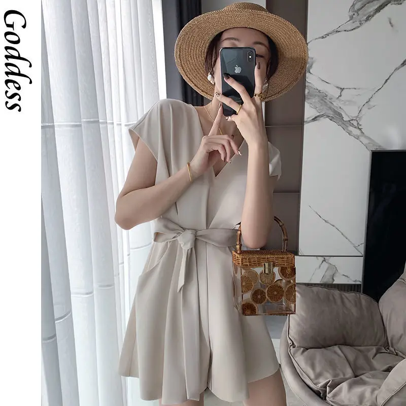 

2021 Spring Summer New Elegant Hepburn Pocket Temperament Waist Slim Short-sleeved Design Sense Lace-up Jumpsuit Dress