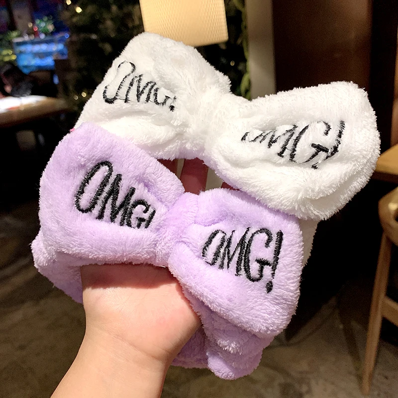 Женская мягкая эластичная повязка на голову с бантиком и надписью OMG из