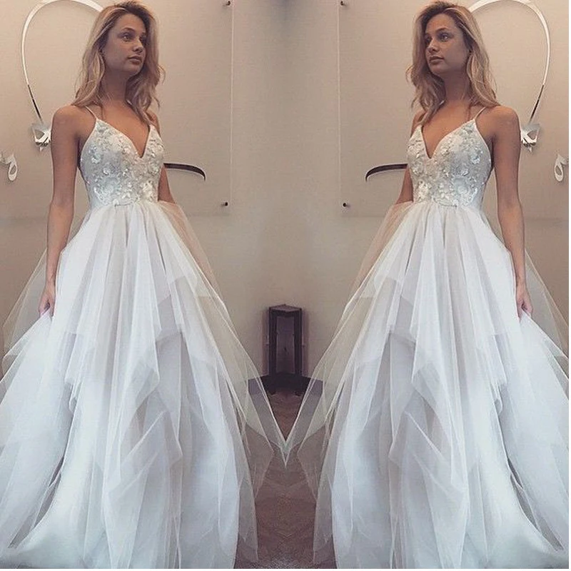

Beautiful white A line floor length tulle spaghetti straps V neck formal gowns white simple wedding dresses