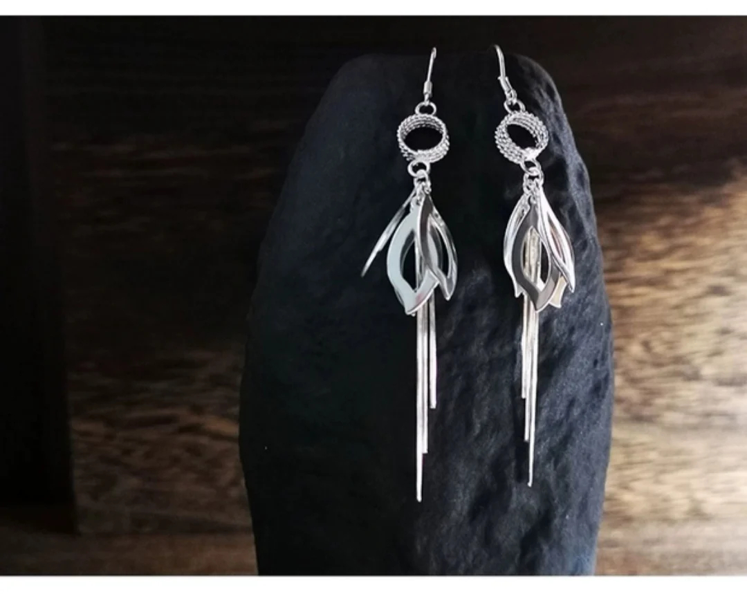 

Twisted leaf tassel earrings