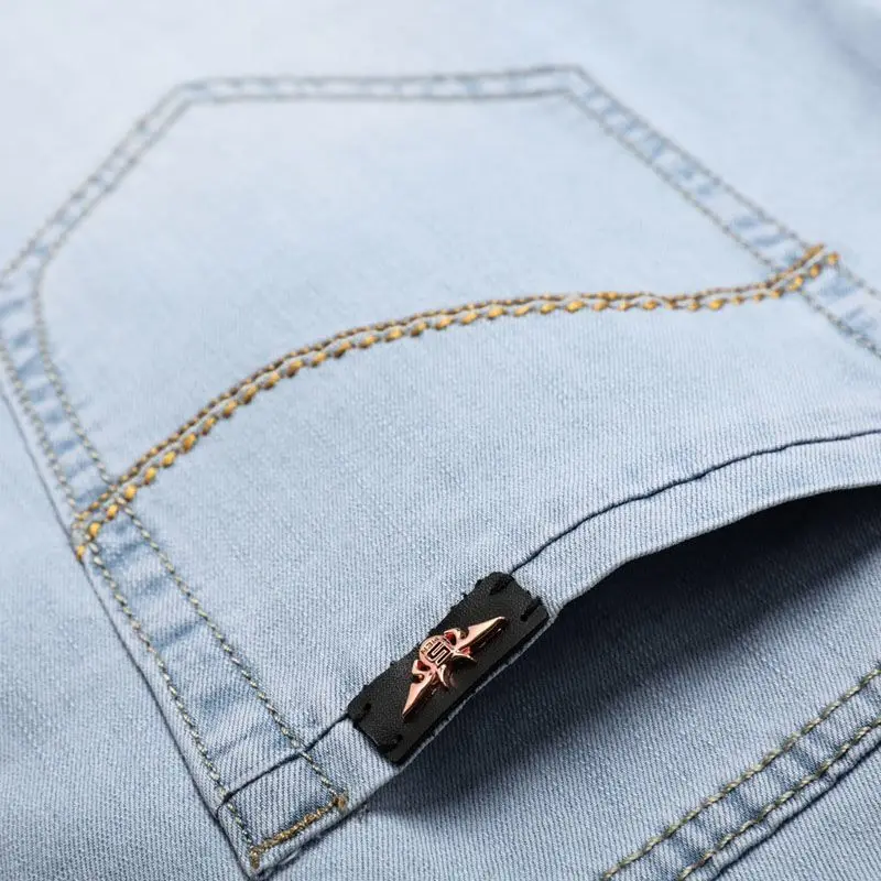 2021light jeans men's plus size straight loose elastic high-end tide brand light blue and white casual trousers bleached jeans