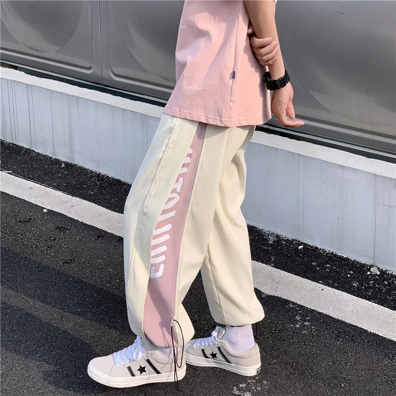 Спортивные брюки с завязкой на щиколотке и принтом | Женская одежда