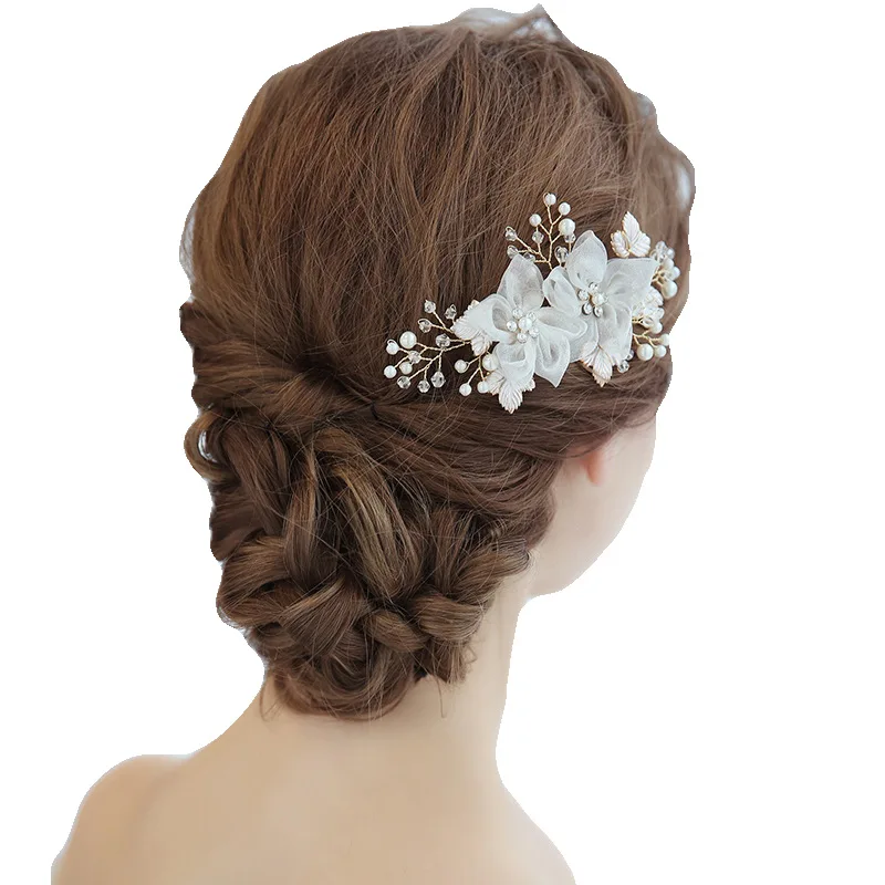 

Bridal fascinators sell bridal gowns and pearl haircombs