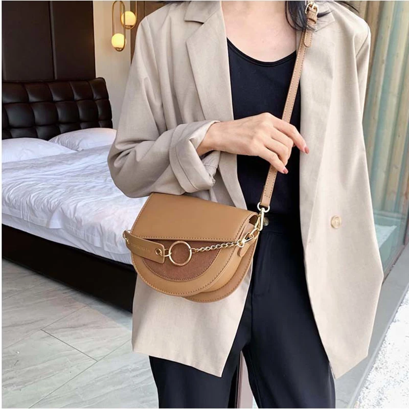 

Stitching suede messenger bag Fashionable woman's saddle bag Personality semicircular shoulder bag Black female bag