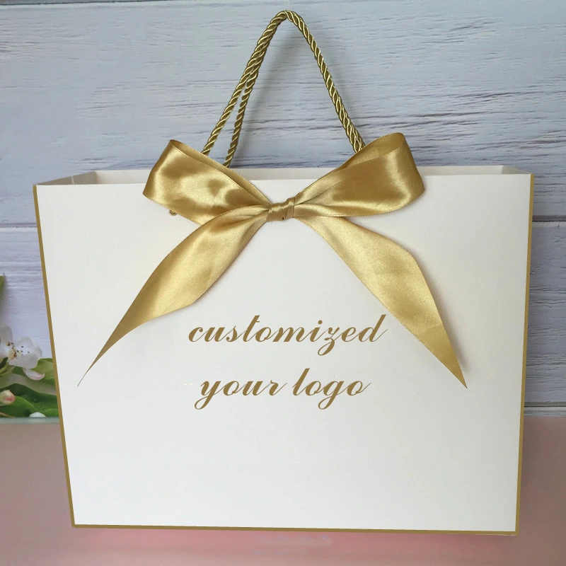 Bolsa de regalo con logotipo personalizado, caja para regalo de boda, paquete de ropa, embalaje de peluca, mango dorado con cinta, color rosa/blanco, 100 Uds.