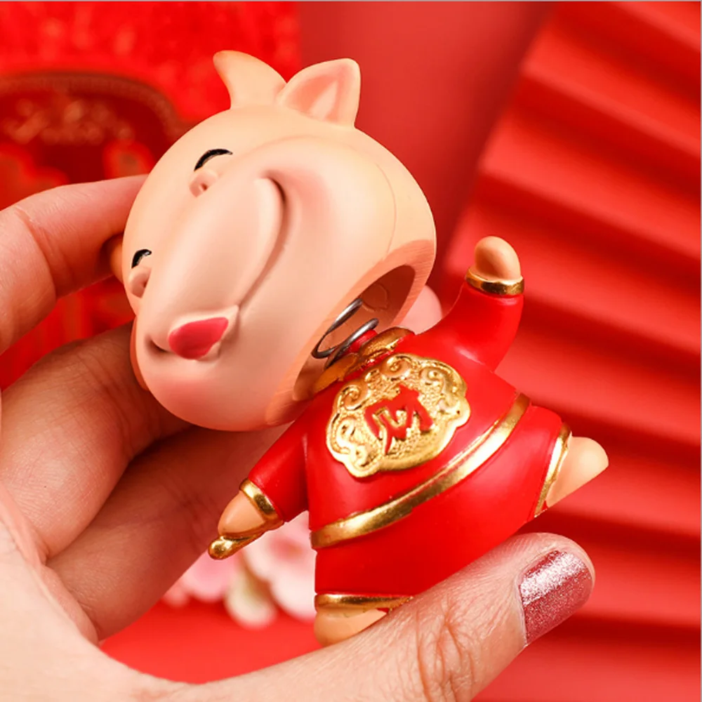 

Cute Year of the Ox Miniature Creative Hold Money Shaking Head Cow Decoration 2021 New Year Gift Creative Home Car Decoration