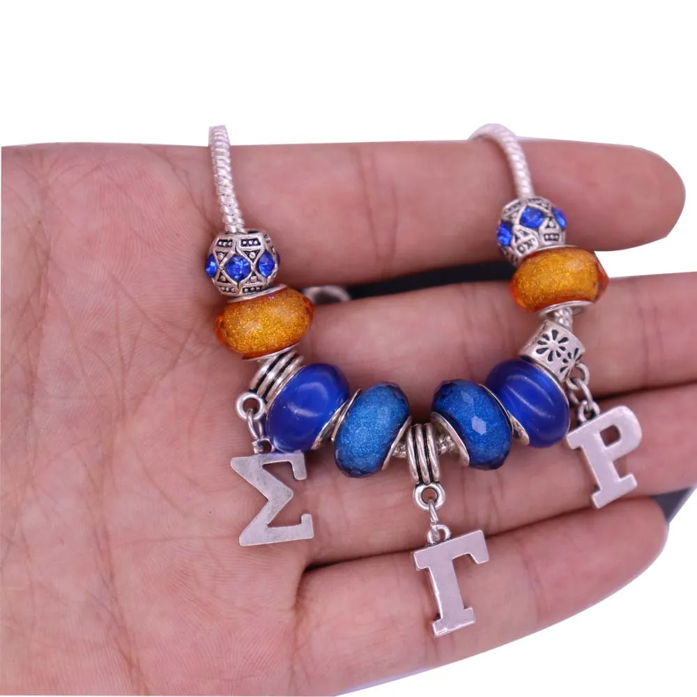 Браслет женское общество с греческими буквами желтого и синего цвета Sigma Gamma Rho