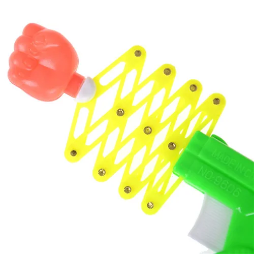 

1PCS Practical Jokes Magic Elastic Telescopic Fist Gun Magic Tricks Toys For Children DIY Manual Toy Kids Toys Random Color