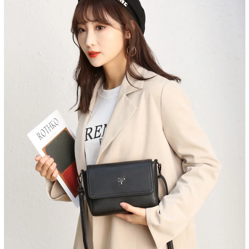 

Woman's bag layer cowhide small bag new version fashion contracted small square bag versatile fashion leather cross-body bag