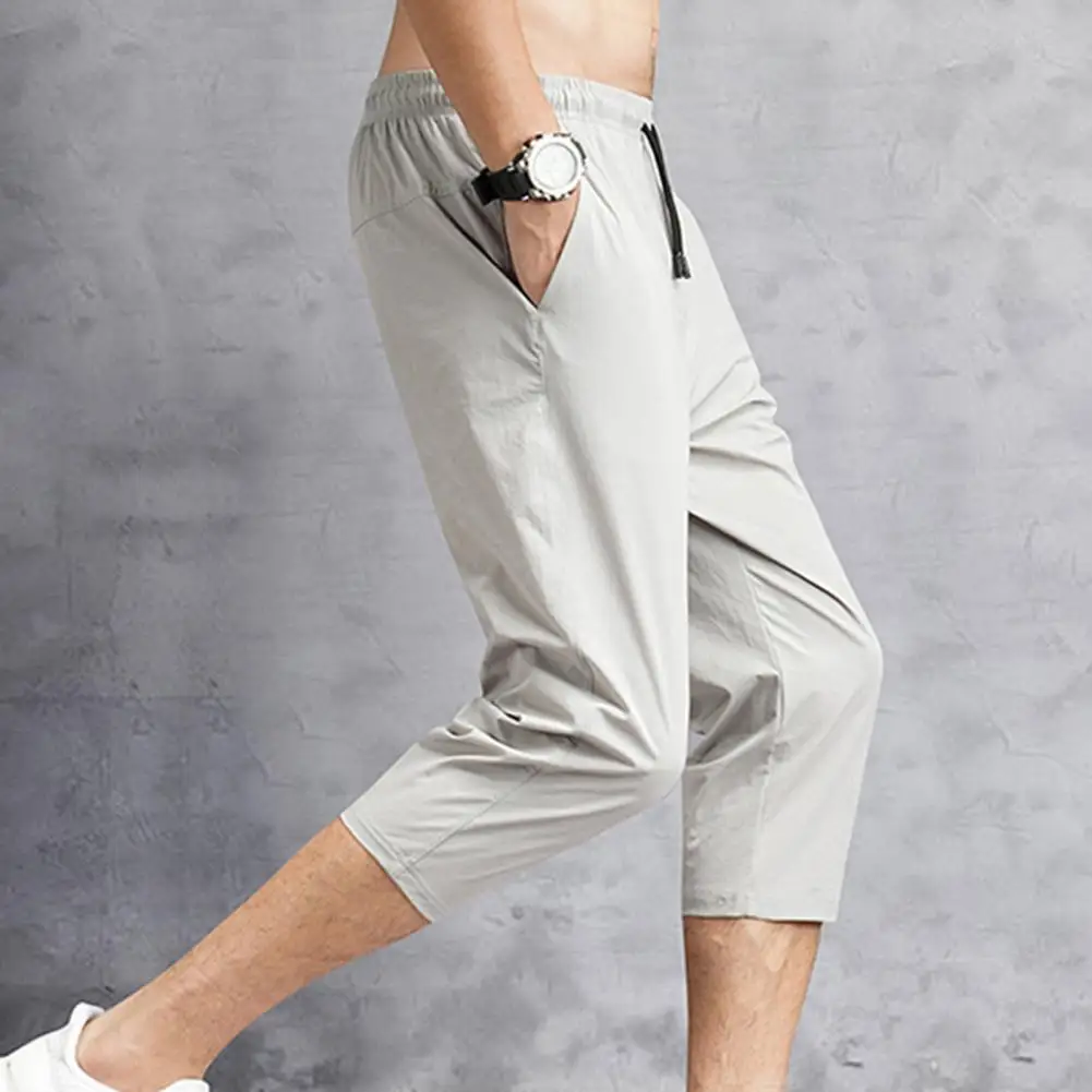 Брюки-Капри мужские спортивные быстросохнущие, однотонные штаны с эластичным поясом, Стрейчевые укороченные брюки, спортивные штаны на зав...