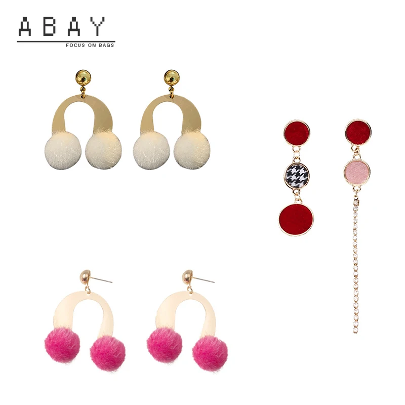 

S925 Silver Needle Hot Sale Asymmetric Tassel Earrings Women New Winter U-shaped Brown Temperament Simple Design Ear Pendant