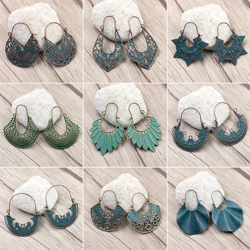 

Retro Vintage Earrings India Alloy Woven U-Shaped Flower Basket Exaggerated Carved Eardrops Wholesale Gift