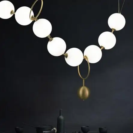 

Nordic style lamps living room lights simple modern atmosphere light luxury restaurant lights magic bean necklace pendant lamp