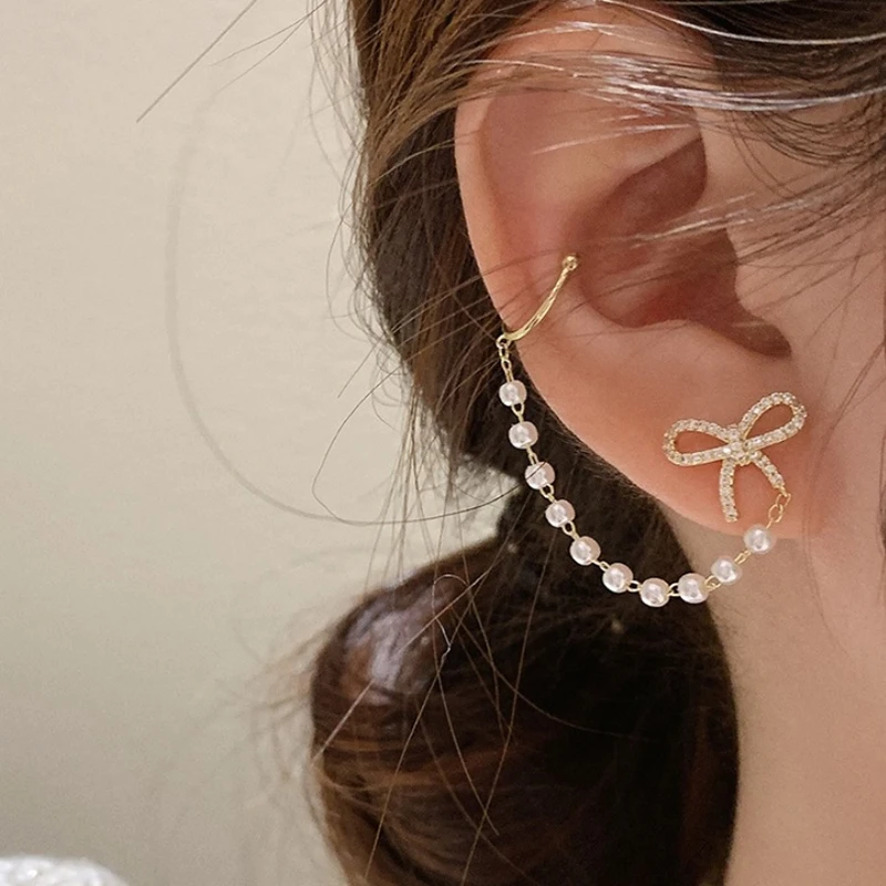 

Korean S925 Bowknot Pearl Tassel Hollow Earrings Sweet Ear Clips 2021 Autumn And Winter Trend Jewelry Creative Party