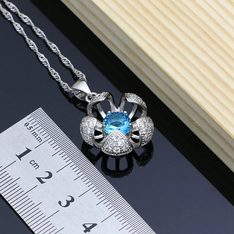 Женский ювелирный комплект из колье серёг кольца и браслета серебро 925 пробы