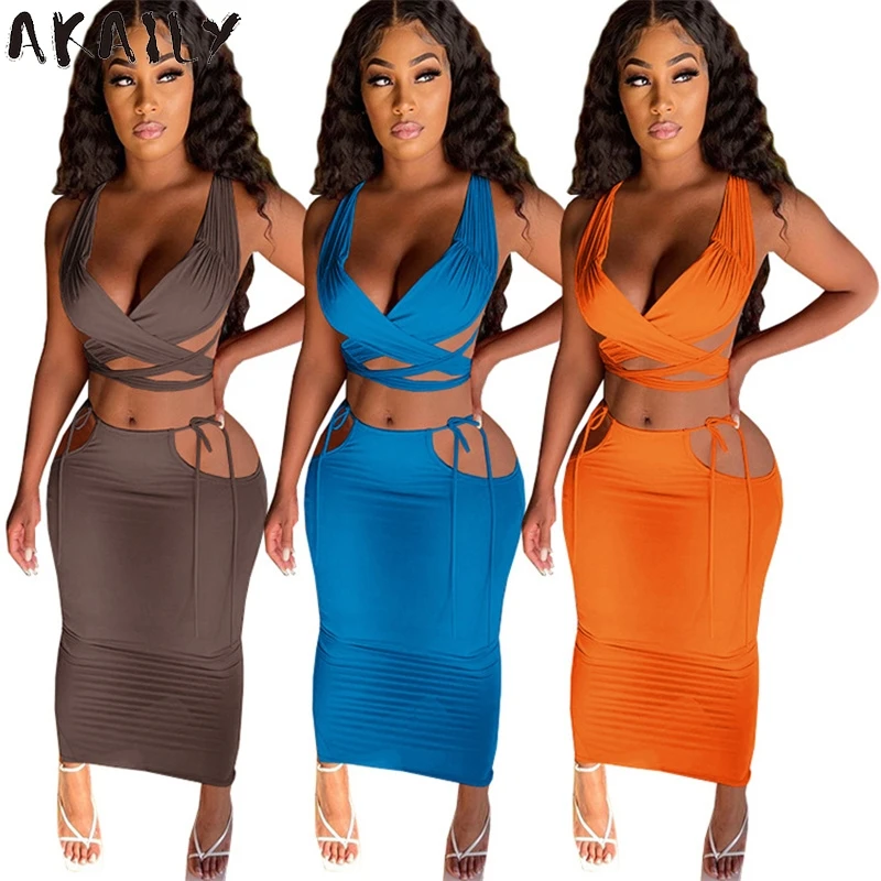 

Akaily Streetwear Halter Backless Crop Top Bandage Slim Dresses Sets Women Hollow Out 2 Two Piece Sets Summer Skirts Sets Female