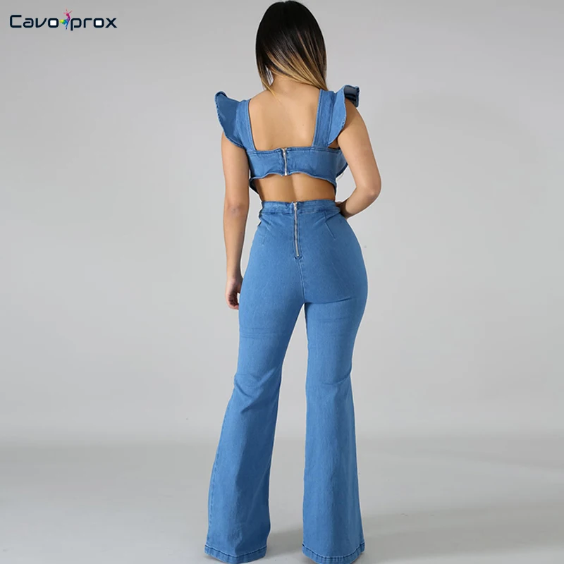 Женский джинсовый комбинезон колокольчик с бабочкой и широкими штанинами