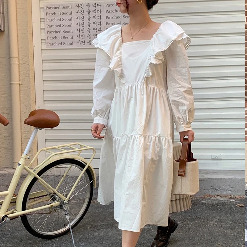 

RUGOD 2021 early spring retro lazy square collar pleated ruffled design large skirt stitching loose slim dress