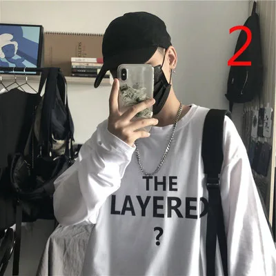 

Autumn long-sleeved T-shirt male round neck Korean version of the loose trend solid color casual wild