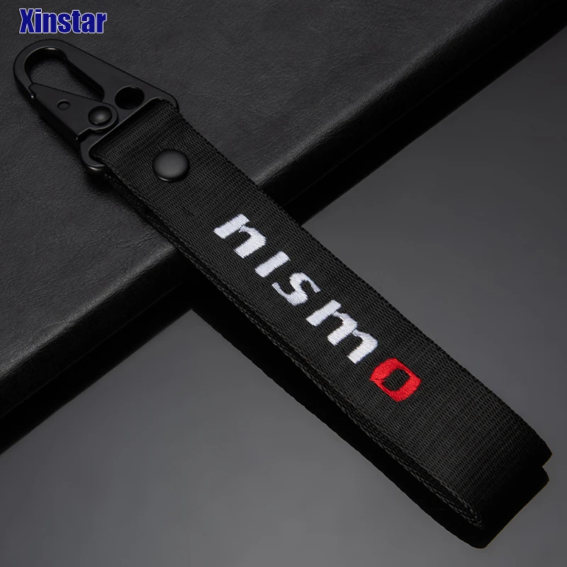 Новейший дизайн нейлоновый автомобильный брелок Nismo для Nissan Tiida Sunny QASHQAI MARCH LIVINA TEANA