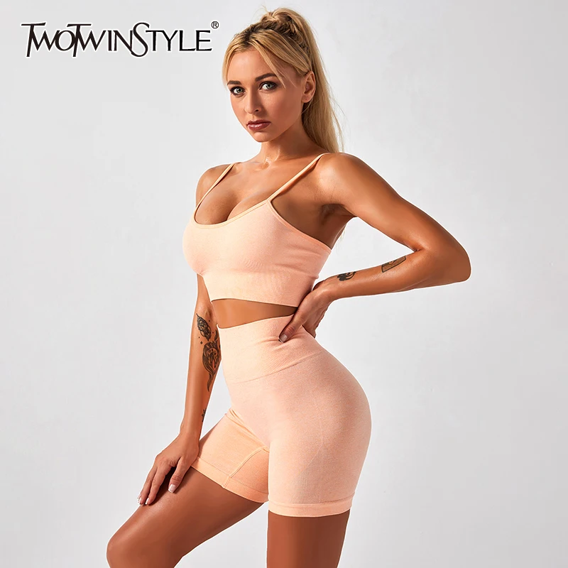 

TWOTWINSTYLE Fitness Yoga Sports Two Piece Sets For Female Cropped Vest With High Waist Shorts Breathable Elastic Set Tide