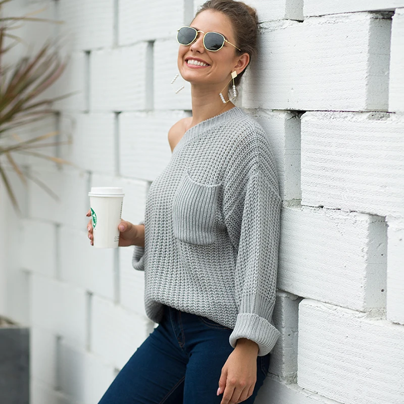 

Autumn / Winter 2019 European and American women's wear large pockets sweater women's thick needle pullover loose sweater