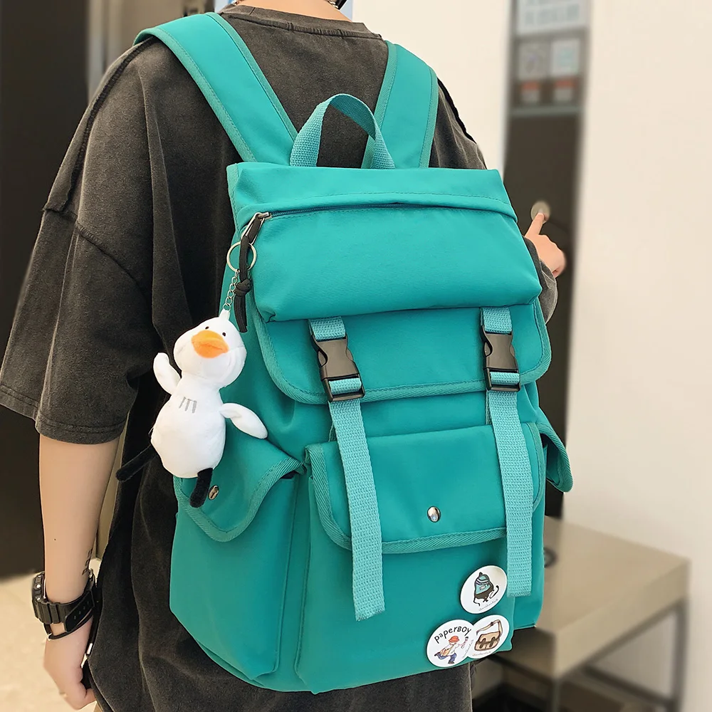 

Fashion Badge Boy Girl College Bag Women Men Solid Color Backpack Laptop Cute Travel Harajuku Student Bag Ladies Backpack Female