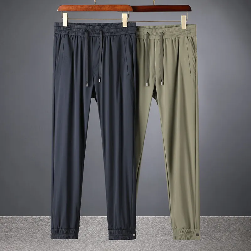 

New Summer Ice Silky Men's Pants Thin Pressure Gel Quick Dry High elastic Men's slim casual trousers Small foot trousers Men